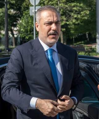 Kurdish forces into the Syrian army