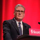 battles to keep his job