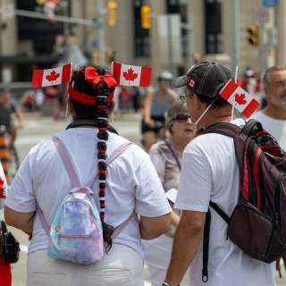 win Canadian visitors back